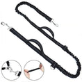 Charger l'image dans la visionneuse de la galerie, Ceinture de traction pour chien en noir avec élastique et poignées confortables pour les promenades