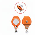 Load image into Gallery viewer, Étui AirTag orange en cuir avec clochette attachée sur collier de chien noir et blanc