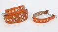 Load image into Gallery viewer, Collier en cuir pour chien orange avec clous métalliques pour un look robuste et tendance