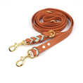 Load image into Gallery viewer, Laisse mains libres pour chien en cuir marron avec mousquetons dorés de Oscar et Plume