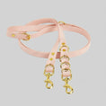 Load image into Gallery viewer, Laisse mains libres pour chien en cuir rose avec attaches métalliques dorées par Oscar et Plume