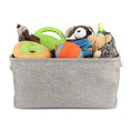 Load image into Gallery viewer, Panier de rangement pour chat et chien gris rempli de jouets en peluche colorés et accessoires