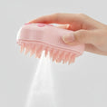 Carica l'immagine nel visualizzatore della galleria, Brosse vapeur chien chat rose tenue à la main avec vapeur diffusée pour toilettage animal