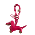 Load image into Gallery viewer, Porte-clés original teckel rose vif en cuir avec cordelette et détails contrastants