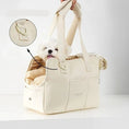Load image into Gallery viewer, Sac voyage pour petit chien beige avec poignée rembourrée et intérieur matelassé confortable