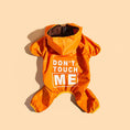 Carica l'immagine nel visualizzatore della galleria, Veste pluie pour chien orange avec capuche et imprimé blanc Don't Touch Me par Oscar et Plume