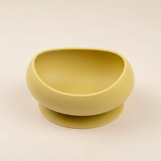 Gamelle en silicone avec ventouse jaune, pour chat et petit chien, stabilité et praticité.