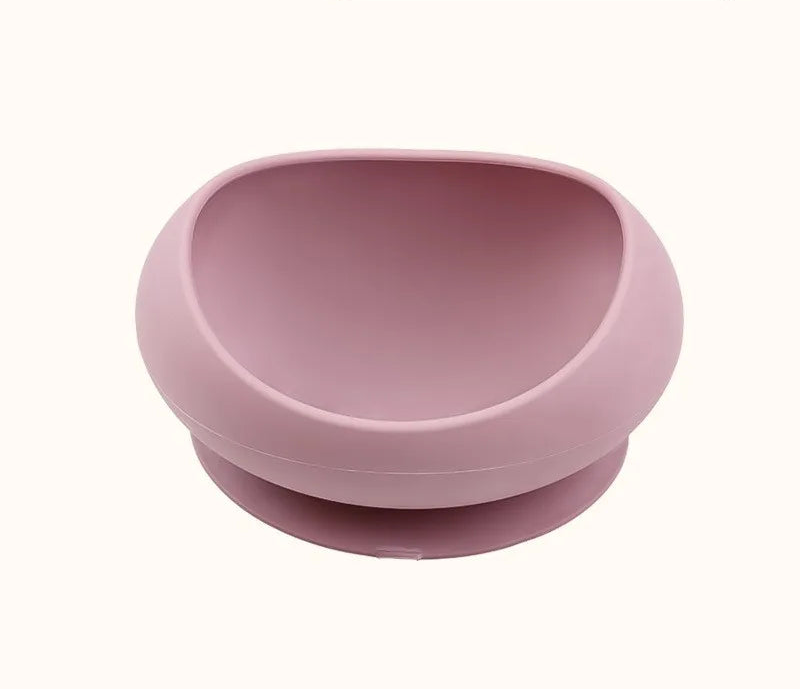 Gamelle en silicone avec ventouse rose pour chat et petit chien, antidérapante et stable.