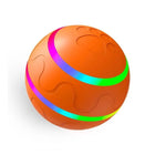 Balle interactive pour chien orange avec motifs colorés et empreinte de patte pour jeu actif