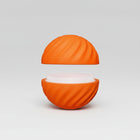 Balle interactive pour chien orange avec texture rainurée et compartiment ouvert pour friandises