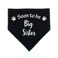 Load image into Gallery viewer, Bandana pour chien noir avec inscription blanche Soon to be Big Sister et pattes de chien
