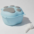 Boîte croquette pour chien bleue en forme de patte avec couvercle gris et petit accessoire assorti