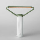 Brosse attrape poils chat et chien Oscar et Plume avec manche ergonomique vert clair