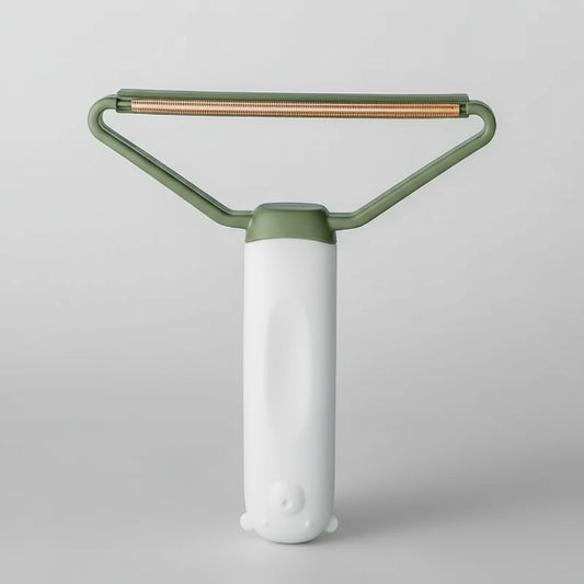 Brosse attrape poils chat et chien Oscar et Plume avec manche ergonomique vert clair