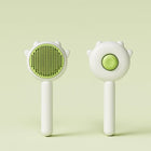 Brosse poils chat Oscar et Plume blanche avec poils verts et ergonomique pour un toilettage facile