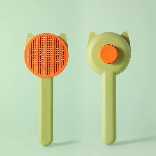 Brosse poils chat Oscar et Plume verte et orange avec poils métalliques pour entretien du pelage