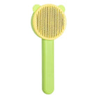 Brosse poils chat couleur vert et jaune avec picots métalliques pour le toilettage des chats