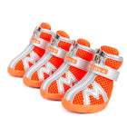 Chaussures imperméables pour chien orange avec fermeture velcro et semelle antidérapante par Oscar et Plume