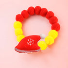 Collier de Noël pour chat et chien en pompons rouges et jaunes avec un chapeau de Noël décoratif