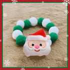 Collier de Noël pour chat et chien avec un motif de Père Noël et des pompons colorés