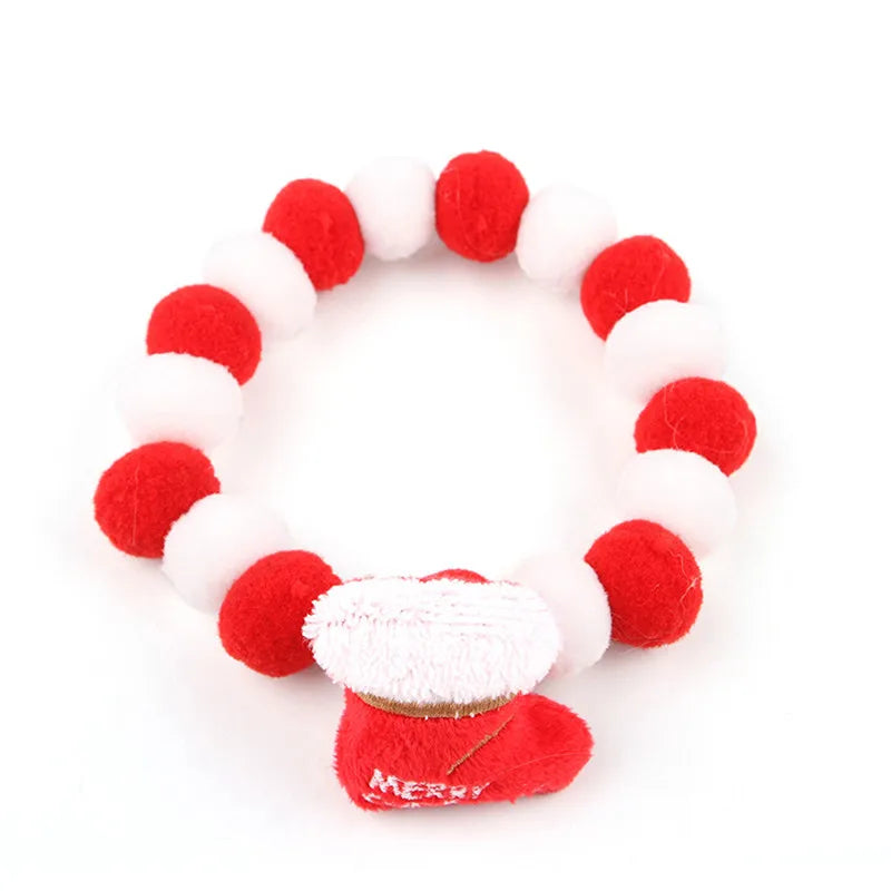 Collier de Noël pour chat et chien avec pompons rouges et blancs et un petit chapeau de Noël