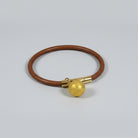 Collier en cuir pour chat de marque Oscar et Plume avec un charm en or élégant