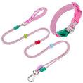 Load image into Gallery viewer, Collier et laisse pour chien en rose avec design en corde et accessoires colorés pour le confort du chien
