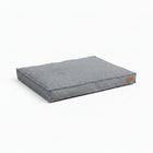 Coussin Pour Chien confortable en tissu gris, parfait pour le repos de votre animal