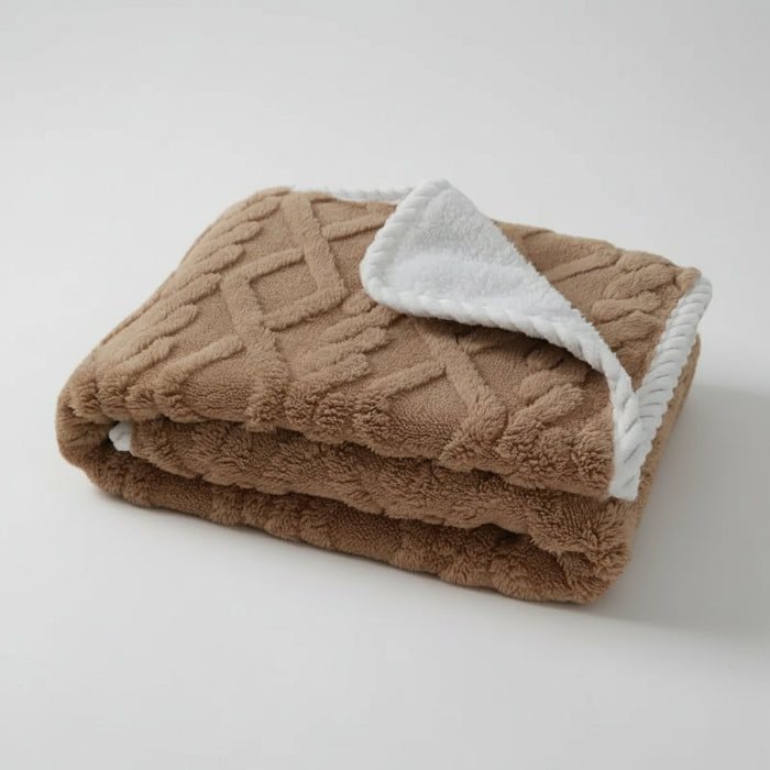 Couverture imperméable Oscar et Plume en brun avec texture douce et légère pour un confort optimal
