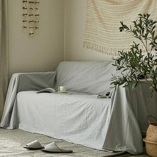 Couverture protection canapé chien et chat grise Oscar et Plume pour protéger les meubles des poils et griffures