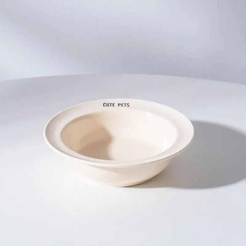 Gamelle céramique surélevée chat en crème avec inscription Cute Pets pour le confort des animaux