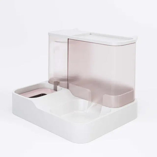 Distributeur croquettes et eau pour chat design compact avec réservoirs transparents blanc et rose