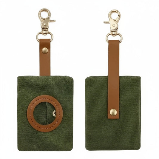 Distributeur de sac à déjections pour chien en tissu vert avec attache en cuir par Oscar et Plume