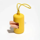 Distributeur de sacs pour chien jaune portable avec sac rose pour ramassage de déjections