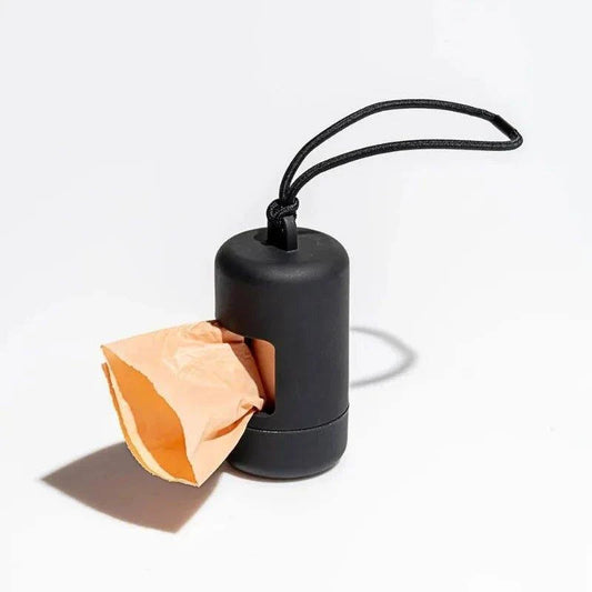 Distributeur de sacs pour chien noir compact avec fixation cordon pratique pour promenades