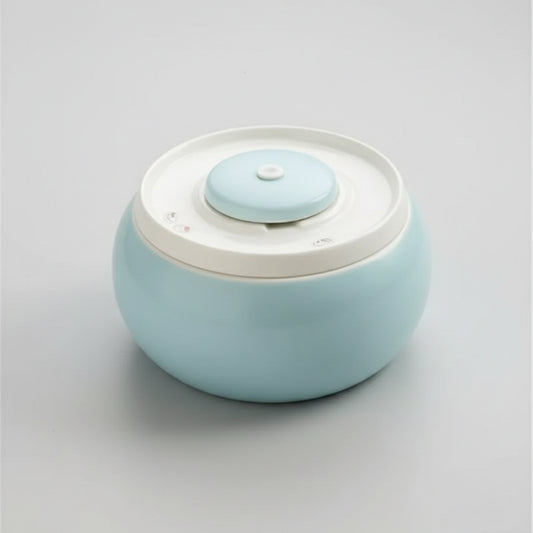 Fontaine à eau pour chat design bleue et blanche Oscar et Plume à poser pour animaux domestiques