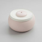 Fontaine à eau pour chat design ronde en rose pastel avec eau filtrée en circulation