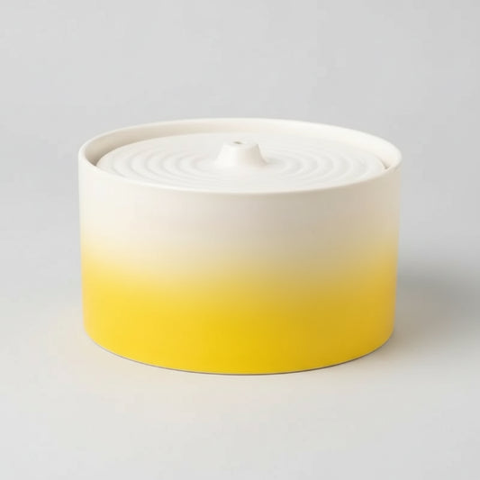 Fontaine en céramique pour chat Oscar et Plume dégradé jaune et blanc pour hydratation facile