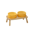 Gamelle céramique chien jaune avec support en bois sur pieds pour repas confortable