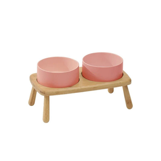 Gamelle céramique chien rose avec support en bois naturel sur pieds pour repas confortable