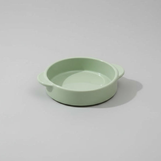 Gamelle design chien vert pastel de la marque Oscar et Plume pour un repas élégant