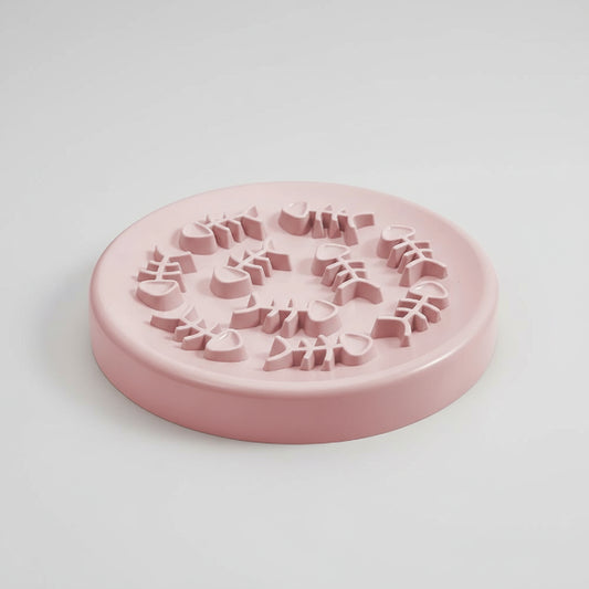 Gamelle pour chat en silicone rose avec motif en relief pour une alimentation interactive