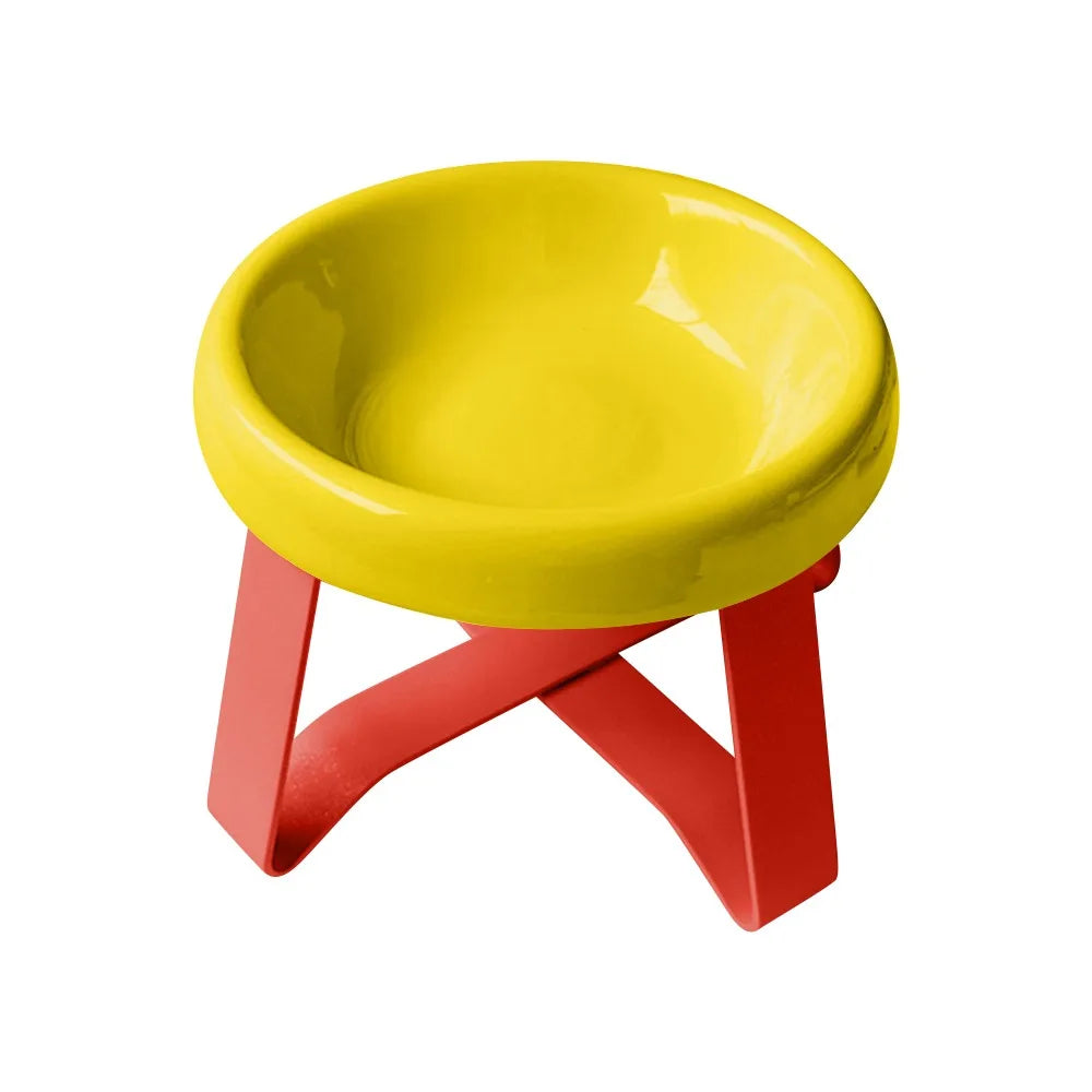 Gamelle sur pieds pour petit chien en céramique jaune avec support rouge stylé
