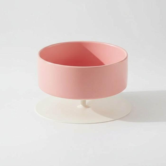Gamelle surélevée pour chat en rose avec base blanche pour un meilleur confort lors des repas