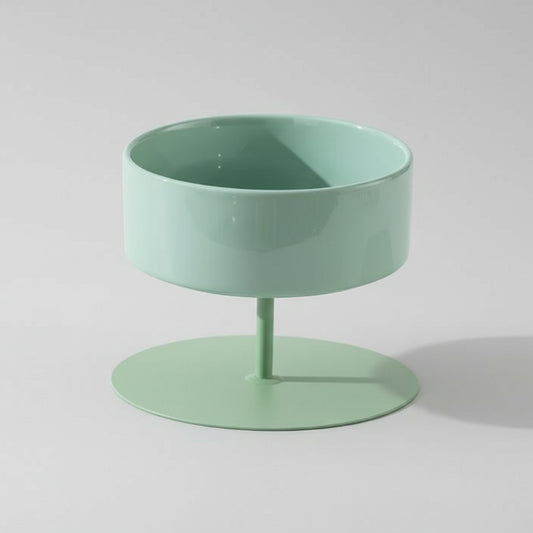 Gamelle surélevée pour chat en vert pastel avec un design moderne et élégant