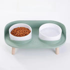 Gamelles design pour chien en vert avec deux bols pour nourriture et eau, surélevées pour un confort optimal