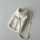 Gilet chien chaud en peluche blanche avec col montant et attache sécurisée pour le confort des animaux