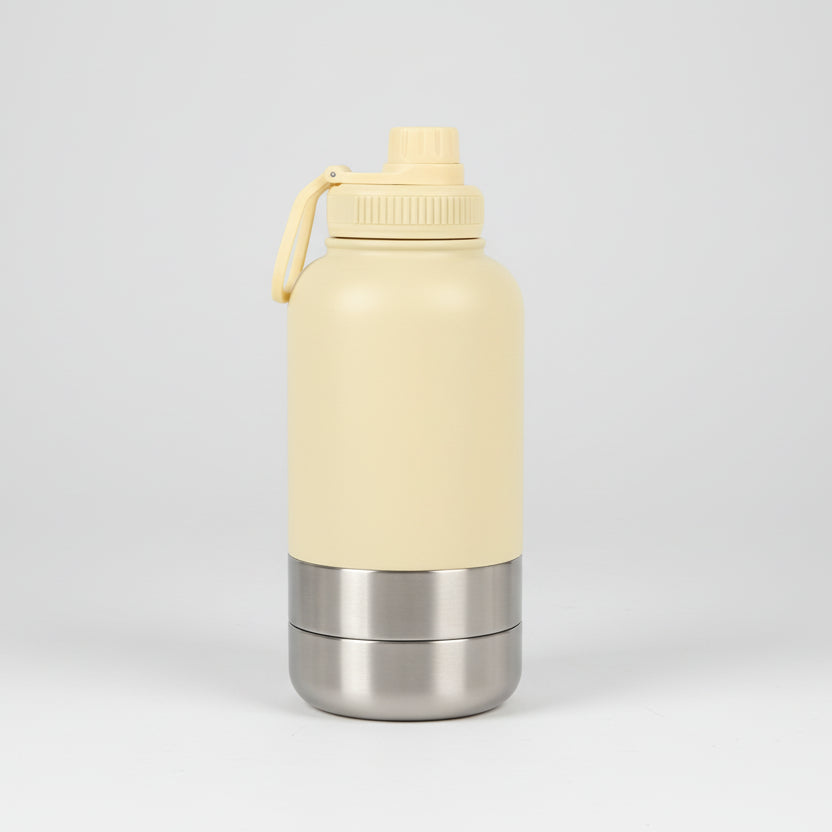 Gourde inox pour chien de couleur beige, idéale pour les promenades et sorties avec votre animal
