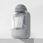 Gourde de voyage pour chien Oscar et Plume en gris avec compartiment pratique pour l'eau