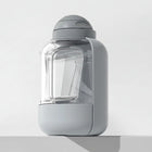 Gourde de voyage pour chien Oscar et Plume en gris avec compartiment pratique pour l'eau